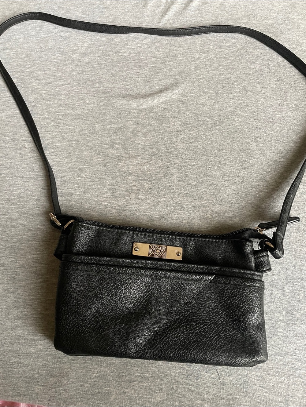 Black Leather Crossbody Bag with Decorative Metal Plate
